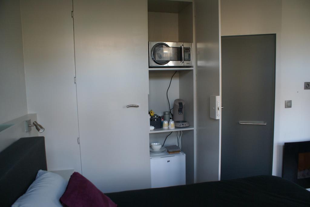 Guest House Feliz Louvain Chambre photo